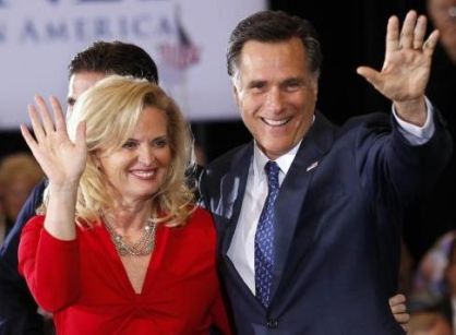 Ann Romney stands alongside husband Mitt Romney.